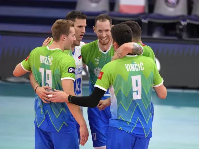 Slovenia team members celebrate winning the firt set during the Men's European Volleyball bronze medal final between France and Slovenia, in Rome, Saturday, Sept. 16, 2023. (AP Photo/Andrew Medichini)