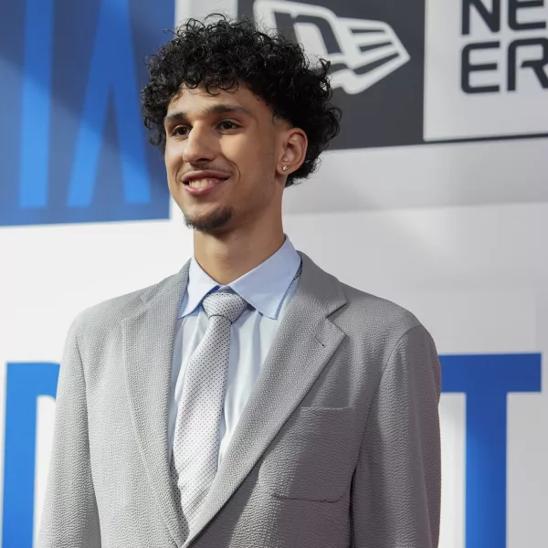 Zaccharie Risacher walks the red carpet before the NBA basketball draft, Wednesday, June 26, 2024, in New York. (AP Photo/Julia Nikhinson)