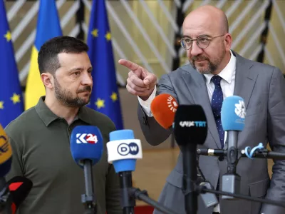 Ukraine's President Volodymyr Zelenskyy, left, and European Council President Charles Michel speak with the media as they arrive for an EU summit in Brussels, Thursday, June 27, 2024. European Union leaders are expected on Thursday to discuss the next EU top jobs, as well as the situation in the Middle East and Ukraine, security and defence and EU competitiveness. (AP Photo/Geert Vanden Wijngaert)