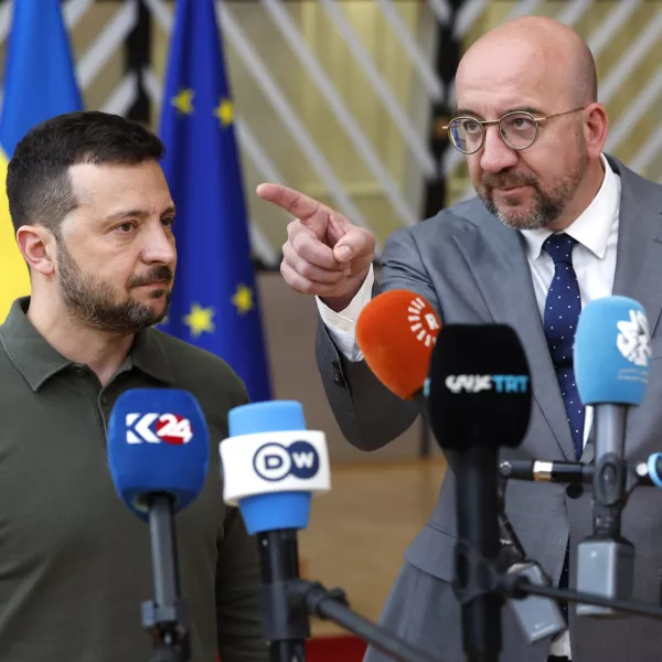 Ukraine's President Volodymyr Zelenskyy, left, and European Council President Charles Michel speak with the media as they arrive for an EU summit in Brussels, Thursday, June 27, 2024. European Union leaders are expected on Thursday to discuss the next EU top jobs, as well as the situation in the Middle East and Ukraine, security and defence and EU competitiveness. (AP Photo/Geert Vanden Wijngaert)