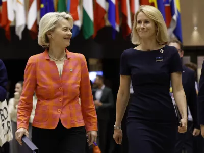 European Commission President Ursula von der Leyen and Estonia's Prime Minister Kaja Kallas walk together to a media conference during an EU summit in Brussels, early Friday, June 28, 2024. European Union leaders signed off a trio of top appointments for their shared political institutions on Thursday evening, reinstalling German conservative Ursula von der Leyen as president of the European Commission for another five years. At the side of von der Leyen should be two new faces: Antonio Costa of Portugal as European Council President and Estonia's Kaja Kallas as the top diplomat of the world's largest trading bloc. (AP Photo/Geert Vanden Wijngaert)