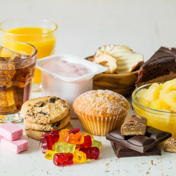 Selection of food high in sugar, copy space