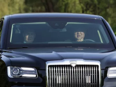 Russia's President Vladimir Putin and North Korea's leader Kim Jong Un ride an Aurus car in Pyongyang, North Korea June 19, 2024. Sputnik/Gavriil Grigorov/Pool via REUTERS ATTENTION EDITORS - THIS IMAGE WAS PROVIDED BY A THIRD PARTY.