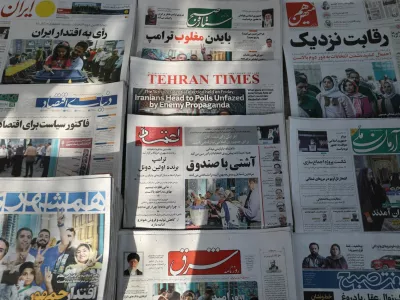 Newspapers with a cover picture of Iran's presidential election are seen in Tehran, Iran June 29, 2024. Majid Asgaripour/WANA (West Asia News Agency) via REUTERS ATTENTION EDITORS - THIS PICTURE WAS PROVIDED BY A THIRD PARTY.