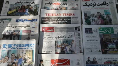 Newspapers with a cover picture of Iran's presidential election are seen in Tehran, Iran June 29, 2024. Majid Asgaripour/WANA (West Asia News Agency) via REUTERS ATTENTION EDITORS - THIS PICTURE WAS PROVIDED BY A THIRD PARTY.