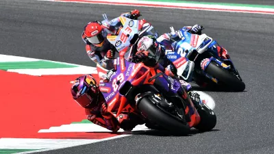 FILE PHOTO: MotoGP - Italian Grand Prix - Mugello Circuit, Scarperia e San Piero, Italy - June 2, 2024 Prima Pramac Racing's Jorge Martin with Ducati Lenovo Team's Enea Bastianini and Gresini Racing MotoGP's Marc Marquez in action during the race REUTERS/Jennifer Lorenzini/File Photo