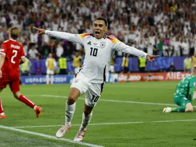 Soccer Football - Euro 2024 - Round of 16 - Germany v Denmark - Dortmund BVB Stadion, Dortmund, Germany - June 29, 2024 Germany's Jamal Musiala celebrates scoring their second goal REUTERS/Wolfgang Rattay