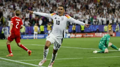 Soccer Football - Euro 2024 - Round of 16 - Germany v Denmark - Dortmund BVB Stadion, Dortmund, Germany - June 29, 2024 Germany's Jamal Musiala celebrates scoring their second goal REUTERS/Wolfgang Rattay