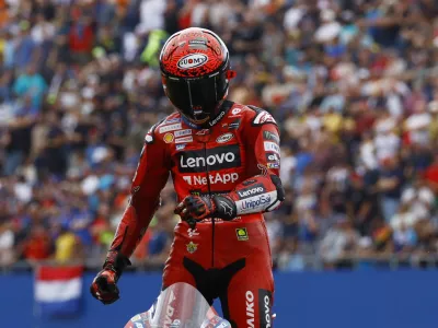 MotoGP - TT Assen Grand Prix - TT Circuit Assen, Assen, Netherlands - June 30, 2024 Ducati Lenovo Team's Francesco Bagnaia celebrates after winning the race REUTERS/Piroschka Van De Wouw