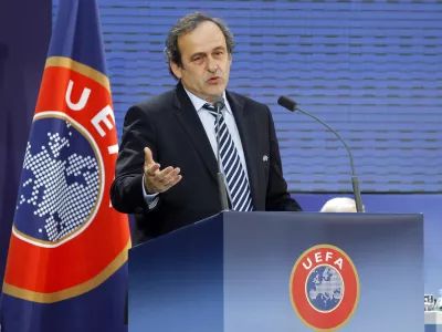 UEFA president Michel Platini of France delivers his speech after being re-elected during the 35th Ordinary UEFA Congress at the Grand Palais in Paris, France, Tuesday, March 22, 2011. Platini has been re-elected as UEFA President until 2015 by acclaim of Europe's 53 football nations. (AP Photo/Francois Mori)