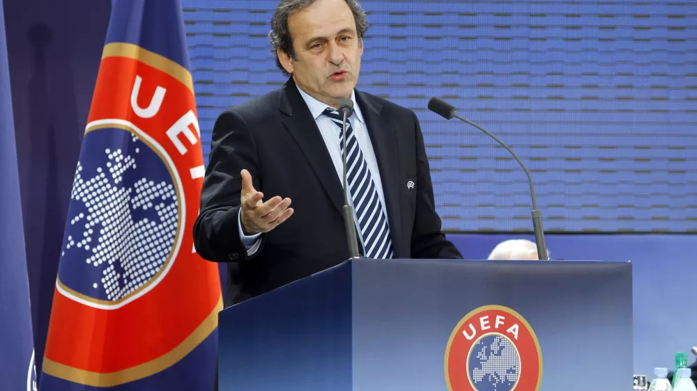 UEFA president Michel Platini of France delivers his speech after being re-elected during the 35th Ordinary UEFA Congress at the Grand Palais in Paris, France, Tuesday, March 22, 2011. Platini has been re-elected as UEFA President until 2015 by acclaim of Europe's 53 football nations. (AP Photo/Francois Mori)