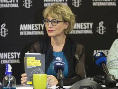 Amnesty International's secretary-general Agnes Callamard attends a news conference in Johannesburg, Monday, March 28, 2022. Amnesty International accuses Russia of committing war crimes in the Ukrainian city of Mariupol. Callamard said the rights organization will soon release an in-depth report on the devastation caused by Russia's assault on the city. (AP Photo/Denis Farrell).