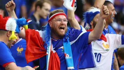 Soccer Football - Euro 2024 - Round of 16 - France v Belgium - Dusseldorf Arena, Dusseldorf, Germany - July 1, 2024 France fans celebrate after the match REUTERS/Bernadett Szabo