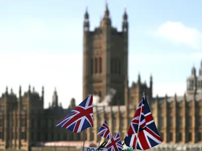 ﻿British Union flags fly in front of The Houses of Parliament in London, Tuesday, Jan. 22, 2019. British Prime Minister Theresa May launched a mission to resuscitate her rejected European Union Brexit divorce deal, setting out plans to get it approved by Parliament. (AP Photo/Frank Augstein)