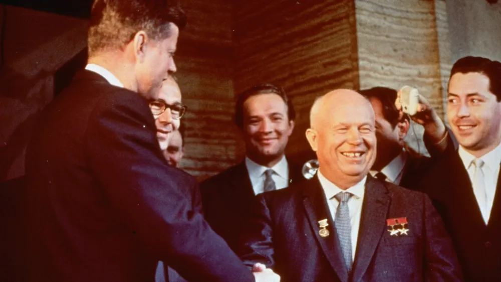 Soviet Premier Nikita Khrushchev, right, shakes hands with President John F. Kennedy at the residence of the U.S. ambassodor in Vienna June 3, 1961. (AP Photo)