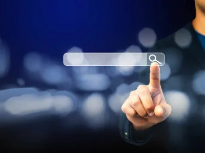 Searching Browsing Internet Data Information Networking Concept,Business man clicking internet search page on computer touch screen,copy space.