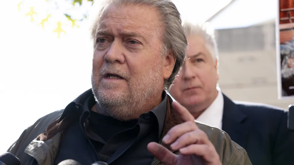 Steve Bannon, longtime ally of former President Donald Trump and convicted of contempt of Congress, speaks to the media as he leaves the federal courthouse in Washington, on Friday, Oct. 21, 2022. Bannon was sentenced to 4 months behind bars for defying Jan. 6 committee subpoena. (AP Photo/Jose Luis Magana)