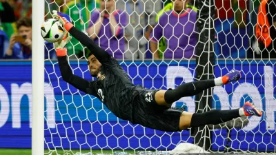 FILE PHOTO: Soccer Football - Euro 2024 - Round of 16 - Portugal v Slovenia - Frankfurt Arena, Frankfurt, Germany - July 1, 2024 Portugal's Diogo Costa saves a penalty during the shootout missed by Slovenia's Jure Balkovec REUTERS/Wolfgang Rattay/File Photo