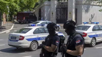 Police officers block off traffic at an intersection close to the Israeli embassy in Belgrade, Serbia, Saturday, June 29, 2024. An attacker with a crossbow has wounded a Serbian police officer guarding the Israeli Embassy in Belgrade. Serbia's interior ministry says the officer responded by fatally shooting the assailant. (AP Photo/Marko Drobnjakovic)