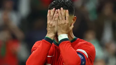 Soccer Football - Euro 2024 - Round of 16 - Portugal v Slovenia - Frankfurt Arena, Frankfurt, Germany - July 1, 2024 Portugal's Cristiano Ronaldo looks dejected after missing a penalty kick REUTERS/Kai Pfaffenbach