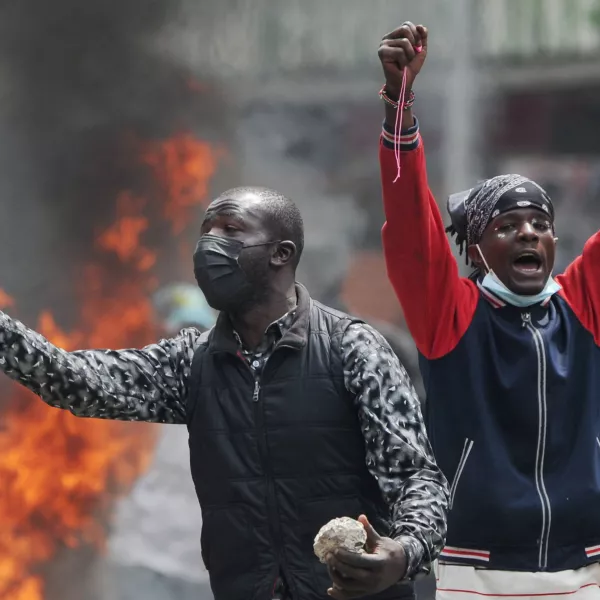 Protesters hold stones during a demonstration over police killings of people protesting against the imposition of tax hikes by the government, in Nairobi, Kenya, July 2, 2024. REUTERS/John Muchucha