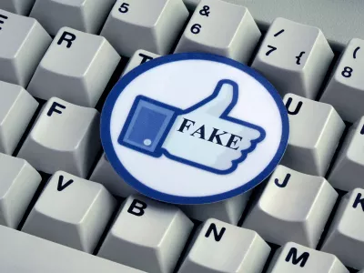 ﻿ILLUSTRATION - A "Like" button with the word "FAKE" on it lies on top of a computer keyboard. Taken on 18.12.2016. Facebook is a social network run by the US-American company of the same name, Facebook Inc. Despite serious criticism, Facebook does not want to take on responsibility for deleting so-called "fake news" themselves. Instead they will give a team of external experts the task. "Fake news" refers to false and incorrect information, often spread on purpose via electronic channels (mainly social media). They are deliberately spread by journalists, office-holders, politicians, companies and private individuals. - NO WIRE SERVICE - Photo by: Sascha Steinach/picture-alliance/dpa/AP Images