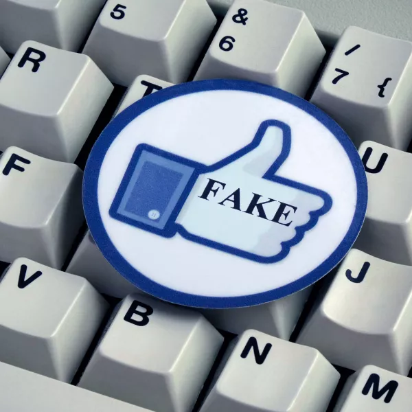 ﻿ILLUSTRATION - A "Like" button with the word "FAKE" on it lies on top of a computer keyboard. Taken on 18.12.2016. Facebook is a social network run by the US-American company of the same name, Facebook Inc. Despite serious criticism, Facebook does not want to take on responsibility for deleting so-called "fake news" themselves. Instead they will give a team of external experts the task. "Fake news" refers to false and incorrect information, often spread on purpose via electronic channels (mainly social media). They are deliberately spread by journalists, office-holders, politicians, companies and private individuals. - NO WIRE SERVICE - Photo by: Sascha Steinach/picture-alliance/dpa/AP Images