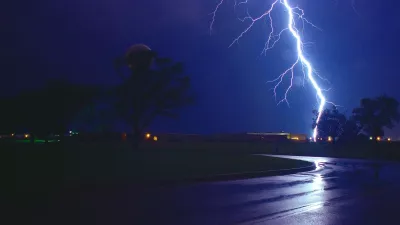 view of a bolt of lightning hitting the ground