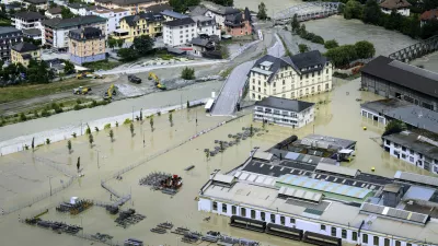 A view of the Rhone river, at right, and the Navizence river, following the storms that caused major flooding, in Chippis, Switzerland, Sunday, June 30, 2024. The Rhone river burst its banks in several areas of Valais canton, flooding a highway and a railway line. (Jean-Christophe Bott/Keystone via AP)