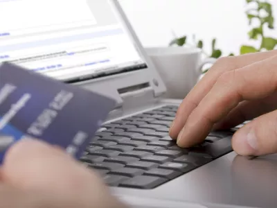 Online shopping using a credit card to complete an e-commerce transaction