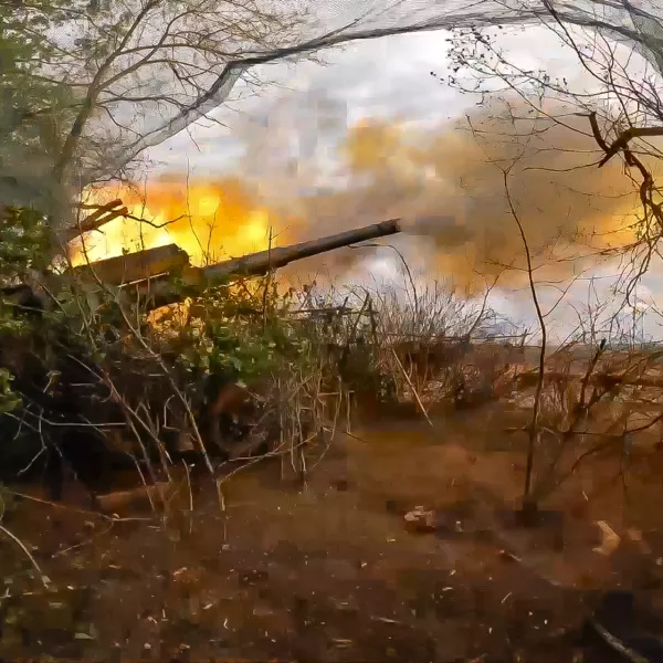 In this photo taken from video released by Russian Defense Ministry Press Service on Wednesday, July 3, 2024, Russian soldiers fire from their 152-mm «Giatsint-B» howitzer from their position at Ukrainian troops at an undisclosed location in Ukraine. (Russian Defense Ministry Press Service via AP)