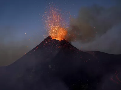 Lava rises from a crater of Mount Etna, Europe's most active volcano, Italy July 2, 2024. REUTERS/Etna Walk/Giuseppe Di Stefano