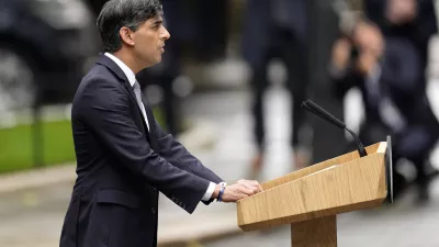 Britain's outgoing Prime Minister Rishi Sunak speaks outside 10 Downing Street in London, Friday, July 5, 2024 before leaving to see King Charles III to offer his resignation after the general election defeat. Britain's Labour Party swept to power Friday after more than a decade in opposition, as a jaded electorate handed the party a landslide victory — but also a mammoth task of reinvigorating a stagnant economy and dispirited nation. (AP Photo/Vadim Ghirda)