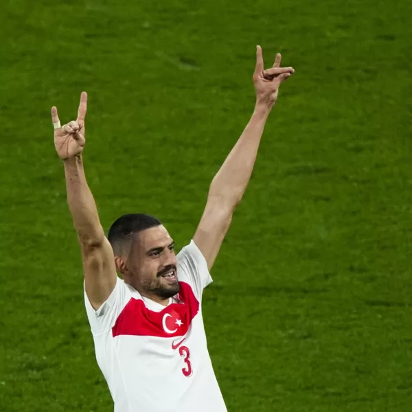 Turkey's Merih Demiral celebrates after scoring his side second goal during a round of sixteen match between Austria and Turkey at the Euro 2024 soccer tournament in Leipzig, Germany, Tuesday, July 2, 2024. UEFA has launched an investigation into Turkey soccer player Merih Demiral's "alleged inappropriate behavior" after he celebrated a goal at Euro 2024 by displaying a hand sign associated with an ultra-nationalist group. (AP Photo/Ebrahim Noroozi)