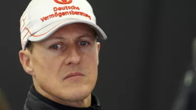 Mercedes Formula One driver Michael Schumacher of Germany stands in his pit during a practice session of the Turkish F1 Grand Prix at the Istanbul Park circuit in Istanbul May 6, 2011. REUTERS/Leonhard Foeger (TURKEY - Tags: SPORT MOTOR RACING)