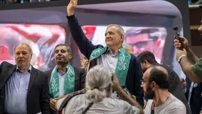 FILED - 23 June 2024, Iran, Tehran: Massud Peseschkian (C), presidential candidate of the reformist camp, arrives at an election rally in the capital. Photo: Arne Immanuel Bänsch/dpa