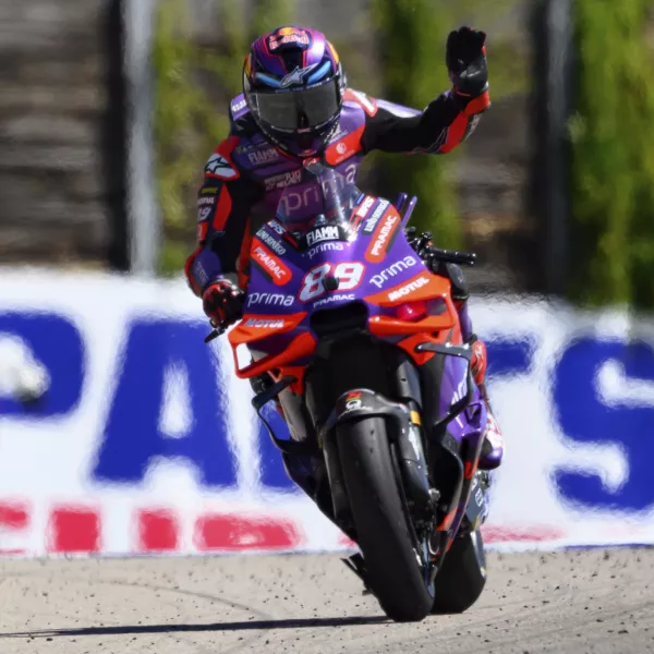 Spain's Jorge Martin waves from his Ducati during a qualifying round at the German Moto Grand Prix, in Hohenstein-Ernstthal, Saturday, July 6, 2024. (Robert Michael/dpa via AP)