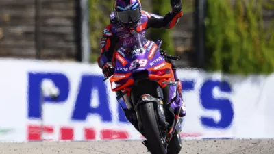 Spain's Jorge Martin waves from his Ducati during a qualifying round at the German Moto Grand Prix, in Hohenstein-Ernstthal, Saturday, July 6, 2024. (Robert Michael/dpa via AP)