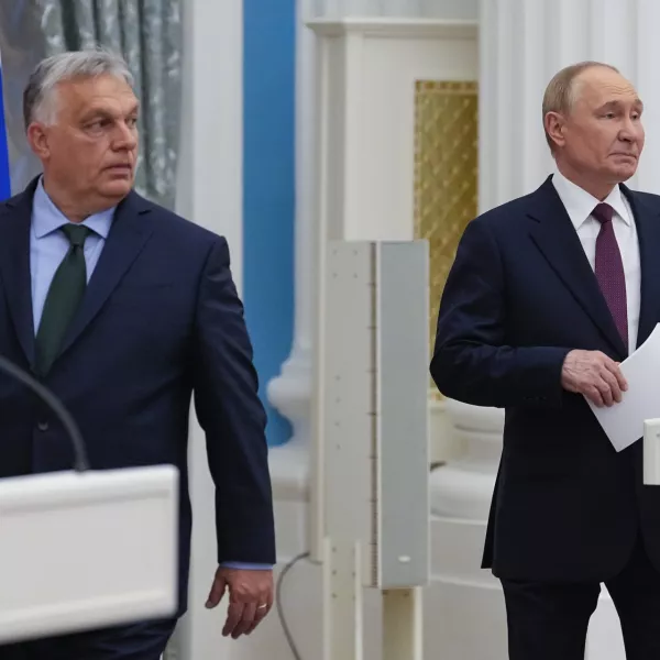 Russian President Vladimir Putin, right, and Hungarian Prime Minister Viktor Orban arrive to make press statements after their talks in the Kremlin in Moscow, Russia, Friday, July 5, 2024. Hungarian Prime Minister Viktor Orban visited Moscow on Friday for a rare meeting by a European leader with Russian President Vladimir Putin and discussed peace proposals for Ukraine, which triggered condemnation from Kyiv and some European leaders and officials. (AP Photo/Alexander Zemlianichenko)