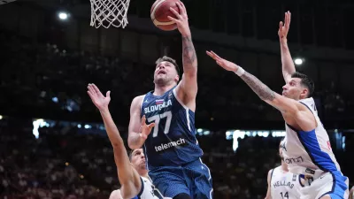 Slovenia's Luka Doncic tries to score against Greece, during an Acropolis tournament basketball match, at the Peace and Friendship indoor stadium at Athens' port city of Piraeus, Saturday, July 6, 2024. (AP Photo/Petros Giannakouris)