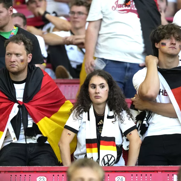 Germany's supporters reacts at the end of a quarter final match between Germany and Spain at the Euro 2024 soccer tournament in Stuttgart, Germany, Friday, July 5, 2024. (AP Photo/Matthias Schrader)