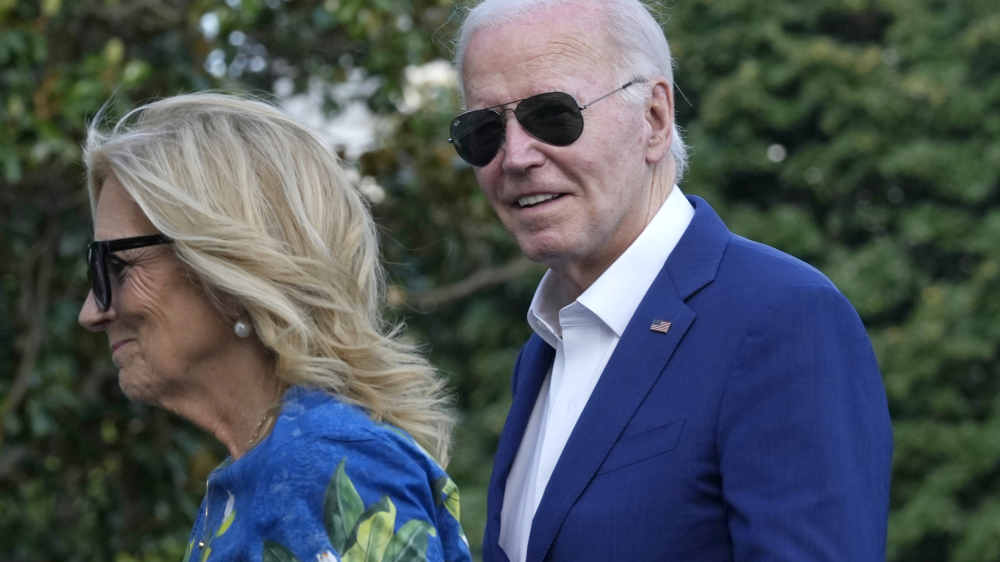 President Joe Biden smiles as he is asked questions by members of the media as he and first lady Jill Biden return on Marine One on the South Lawn of the White House in Washington on Sunday, July 7, 2024, after attending events in Pennsylvania. (AP Photo/Susan Walsh)