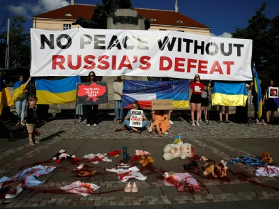 People attend a rally condemning a recent Russia's attack on children's hospital in Kyiv, in Prague, Czech Republic, July 8, 2024.   REUTERS/David W Cerny