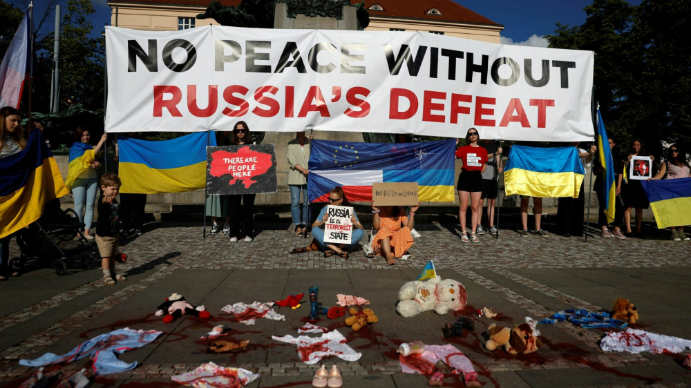 People attend a rally condemning a recent Russia's attack on children's hospital in Kyiv, in Prague, Czech Republic, July 8, 2024.   REUTERS/David W Cerny