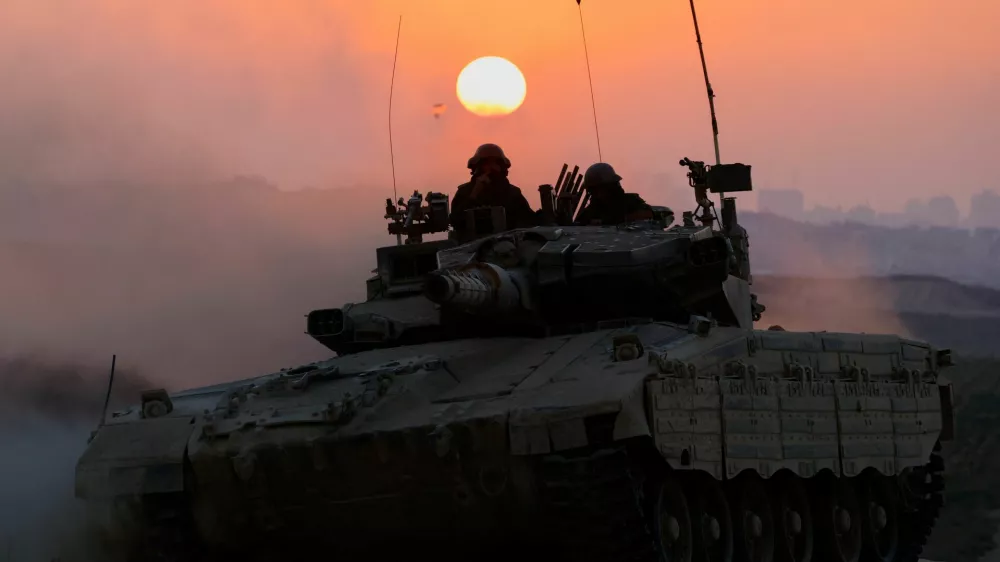 An Israeli tank manoeuvres, amid the Israel-Hamas conflict, near the Israel-Gaza border, in Israel, July 9, 2024. REUTERS/Amir Cohen