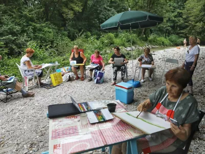 društvo franc govekar Ig10.07.2024 - Iški vintgar - poletna ohladitev - vročinski val - poletne počitniceFOTO: Luka Cjuha