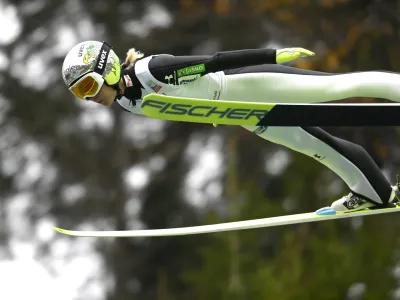 Slovenia's Ema Klinec competes during the FIS Women's HS134 qualification at the Ski Jumping World Cup in Wisla, Poland, Friday, Nov. 4, 2022. (AP Photo/ Adam Nurkiewicz)