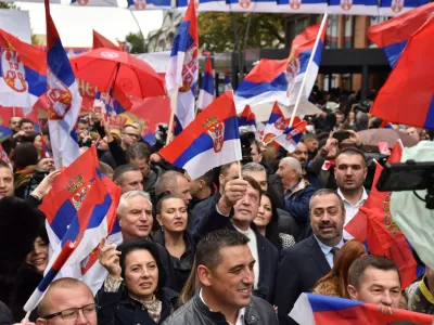 People wave Serbian flags as they protest following local Serbs' decision to leave Kosovo institutions, in North Mitrovica, Kosovo, November 6, 2022. REUTERS/Laura Hasani