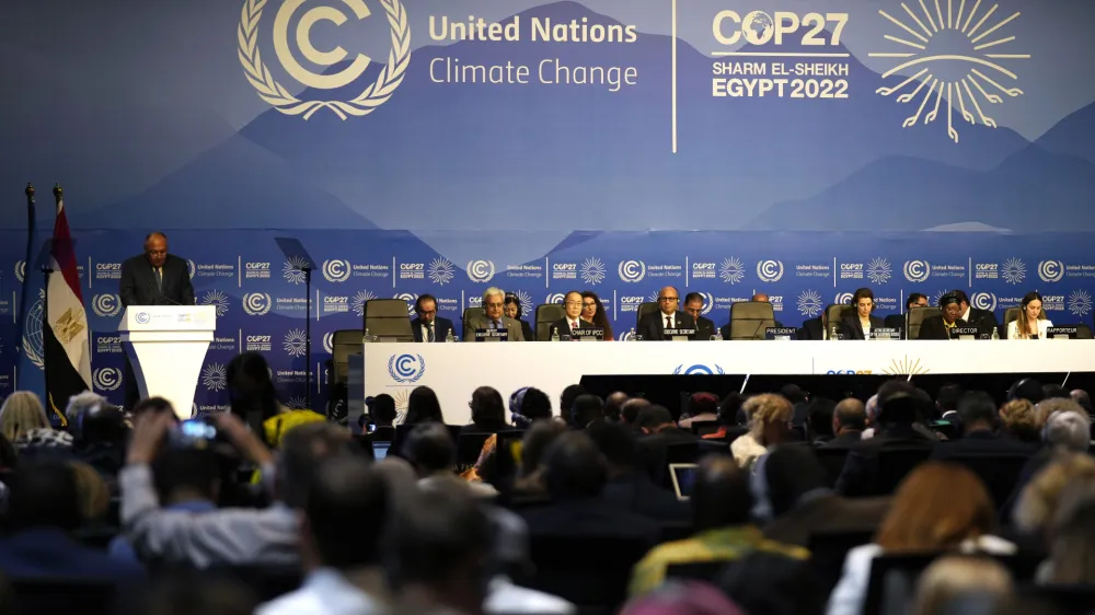 Sameh Shoukry, president of the COP27 climate summit, left speaks during an opening session at the COP27 U.N. Climate Summit, Sunday, Nov. 6, 2022, in Sharm el-Sheikh, Egypt. (AP Photo/Peter Dejong)