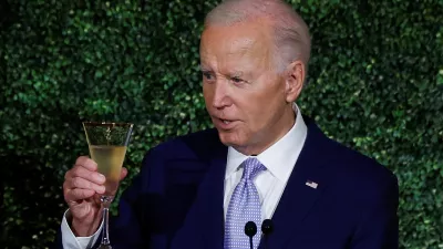 U.S. President Joe Biden makes a toast during a dinner for NATO allies and partners at the White House during NATO's 75th anniversary summit in Washington, U.S., July 10, 2024. REUTERS/Evelyn Hockstein